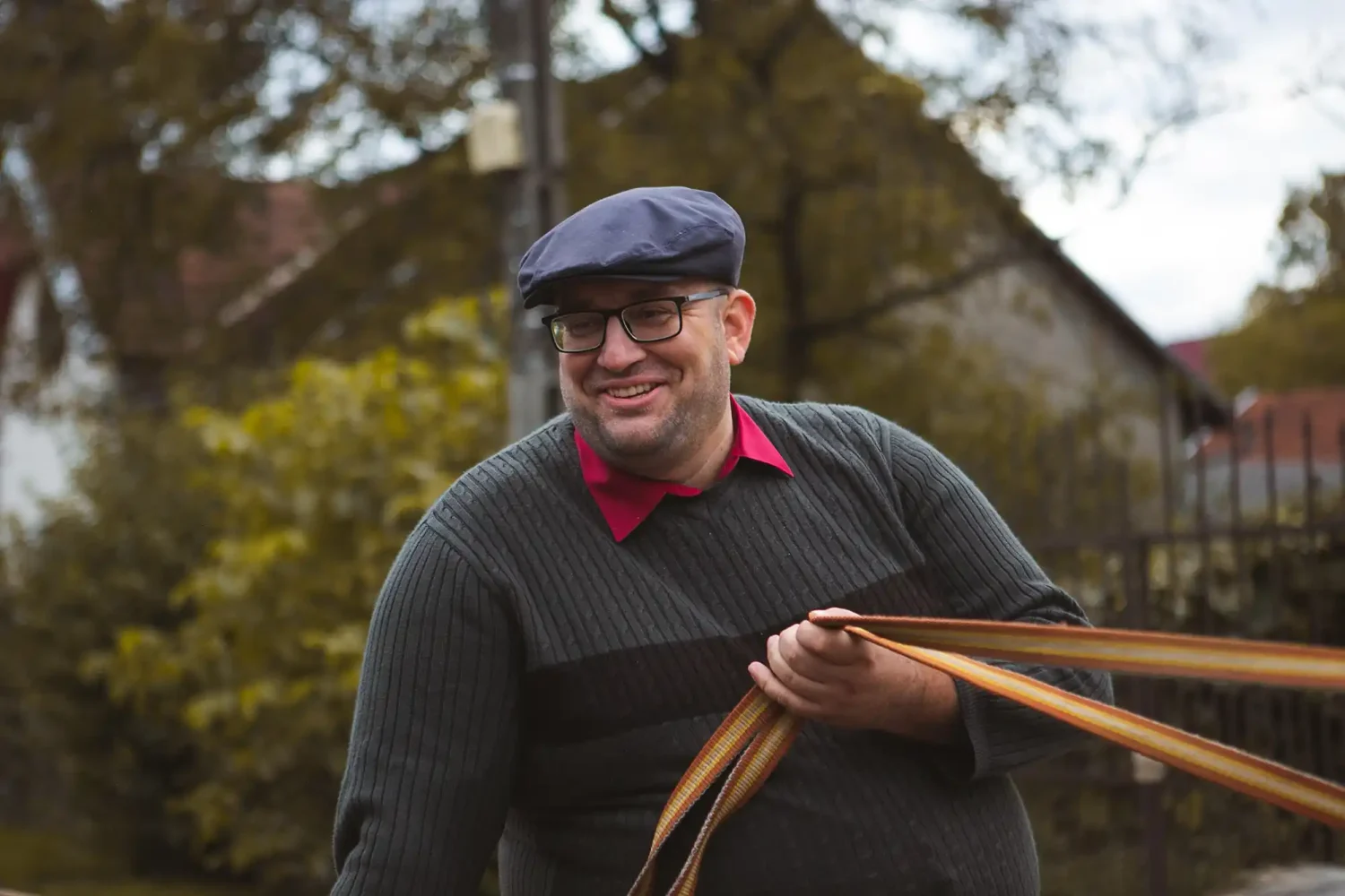 Smiling man on horse cart