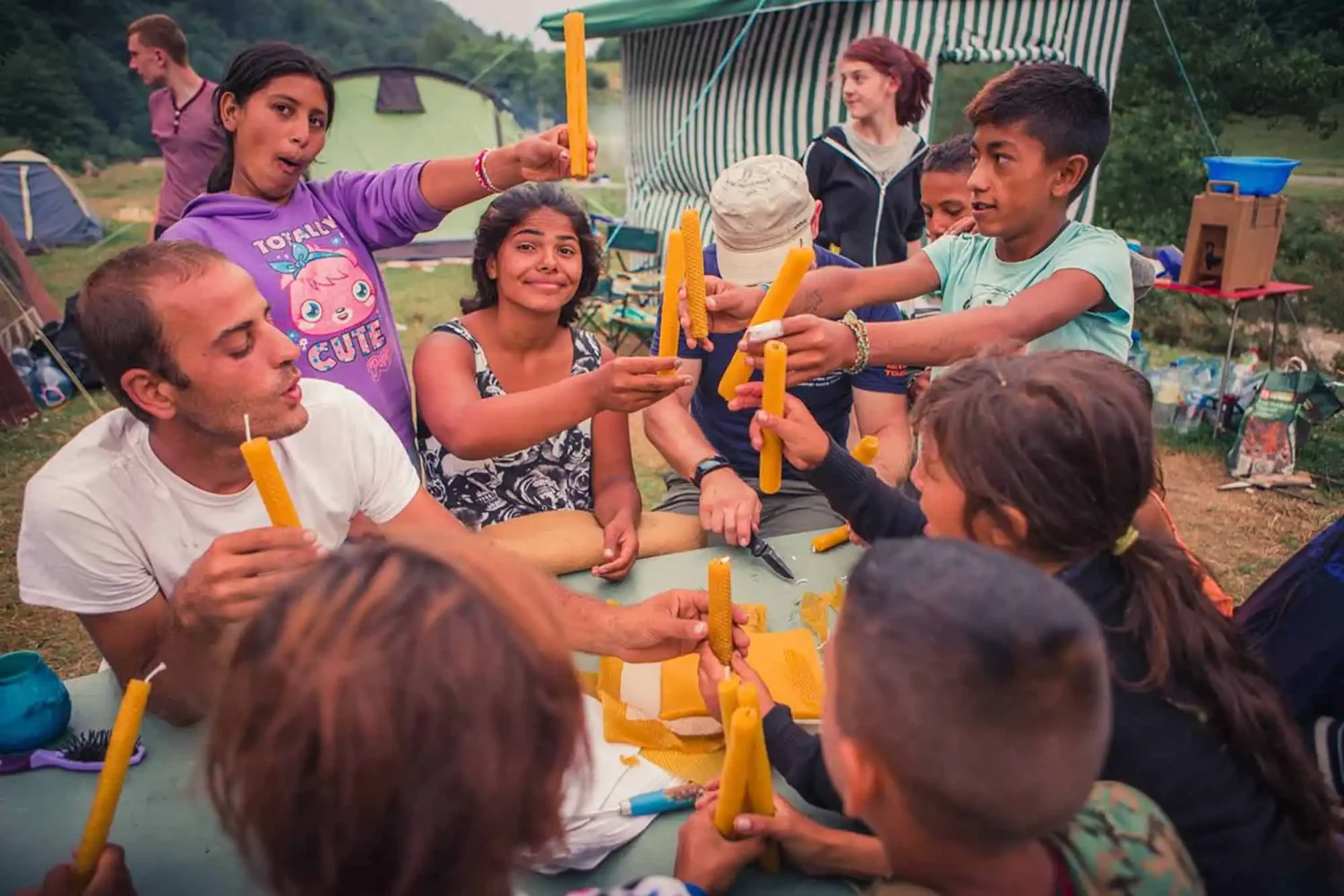 Izidor at children's camp with children and candles